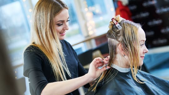 Woman at hairdresser