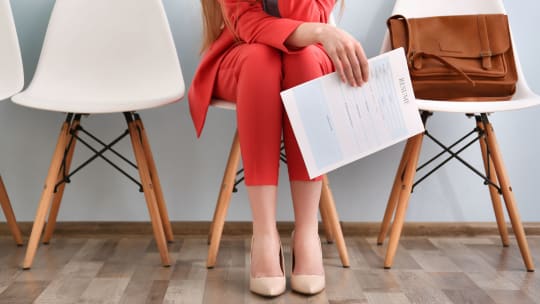 woman typing combination resume