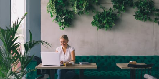 Woman working in cafe