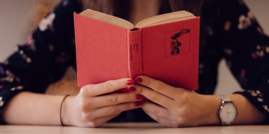 Woman holding book