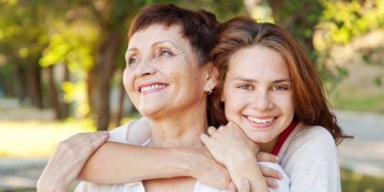 Mom and daughter hugging