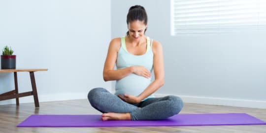 Pregnant woman exercising