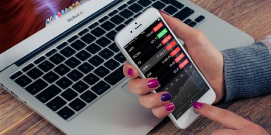 woman looking at stock market