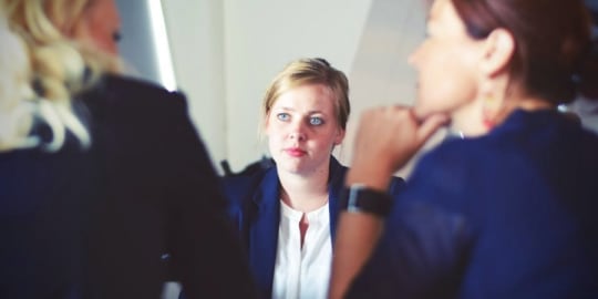 Woman looking at boss