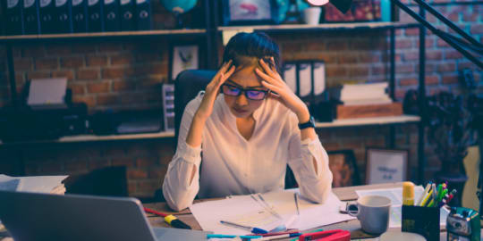 Stressed woman at work