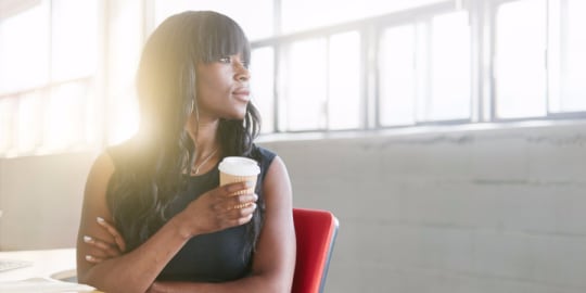 Woman looking out window
