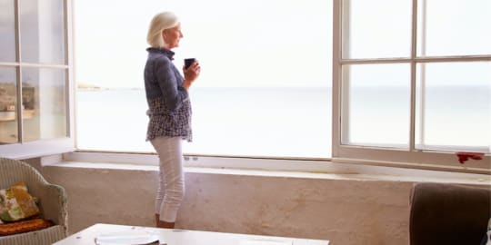 Woman gazing out window