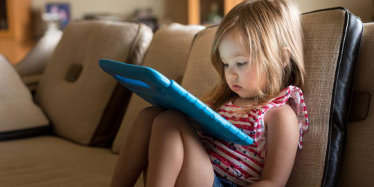 girl using ipad