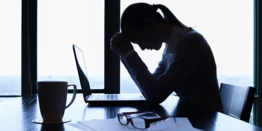 Sad woman at work