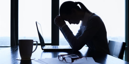 Stressed woman at work