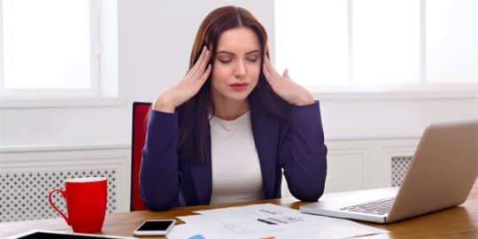 Anxious woman at work