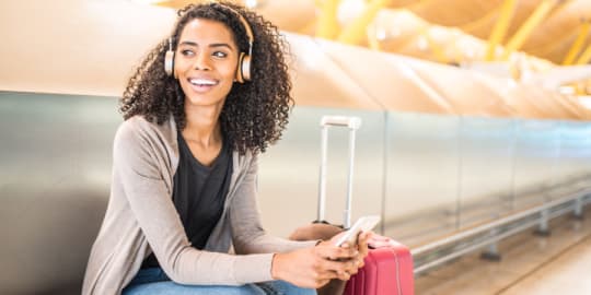 woman listening to podcast