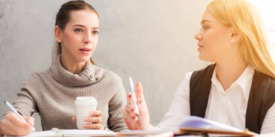 Female Coworkers Collaborating