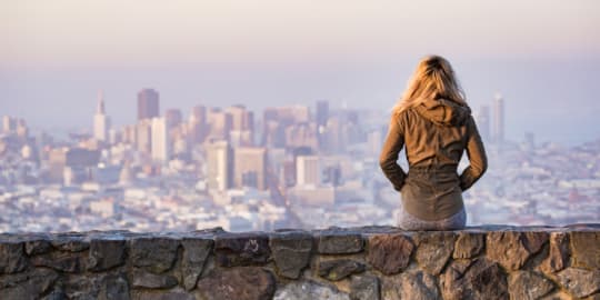 Woman Looking at Cityscape