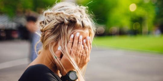 Woman embarrassed by awkward interaction