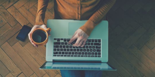 Woman writing follow-up letter