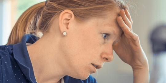 woman stressed at work