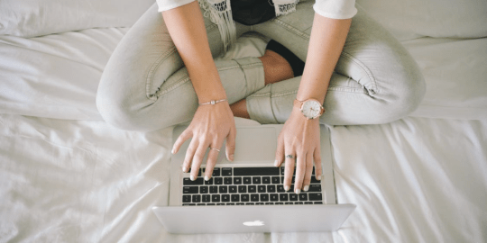 woman typing on computer