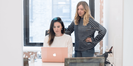 women working on taxes