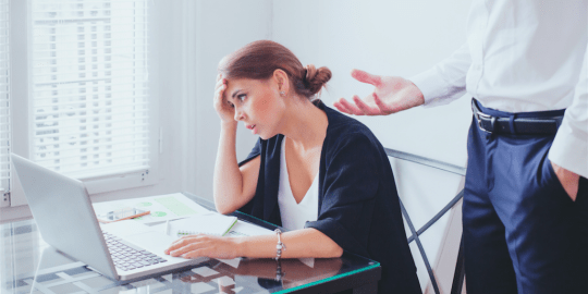 Woman facing sexism at work