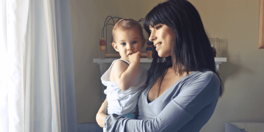 woman holding a baby