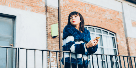 woman holding shopping bags