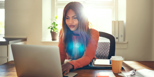 woman working from home in her pajamas