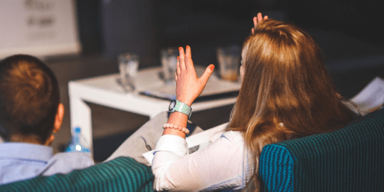 woman explaining her ideas in a meeting