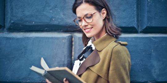 professional woman reading a book