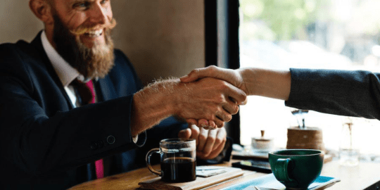 Employer and Employee Shaking Hands