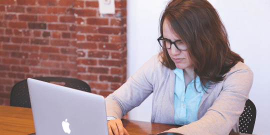 frustrated woman checking email