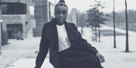 woman leader sitting outside