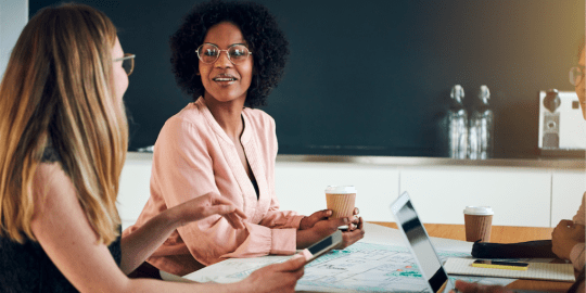 women talking at work