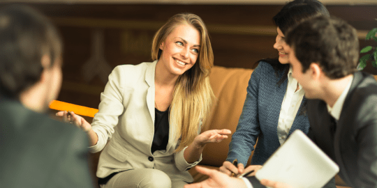 colleagues talking in a meeting