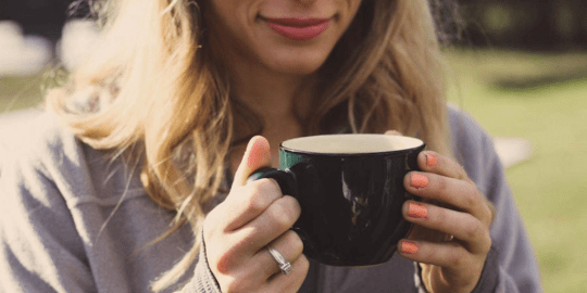 Woman Relaxing with Hot Drink