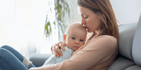 Woman with sick baby