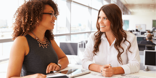 Women talking at work