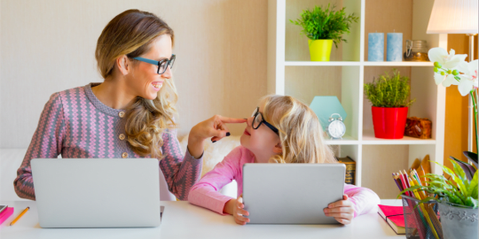 Woman working with child