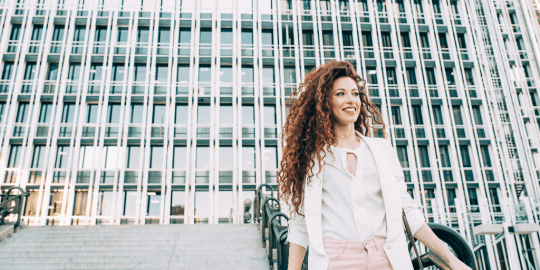 woman standing outside office building