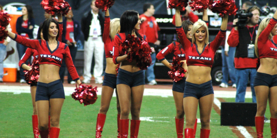 NFL Cheerleader Shown on Jumbotron at Game