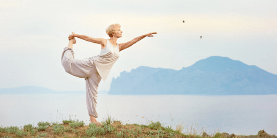 Woman Alone on Vacation, Doing Yoga