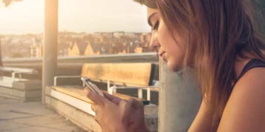 woman browsing on phone