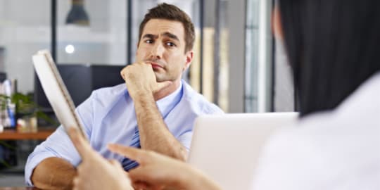 Skeptical interviewer