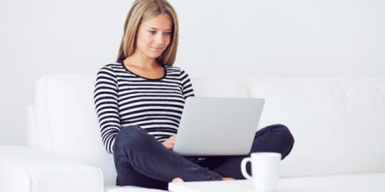 woman writing cover letter