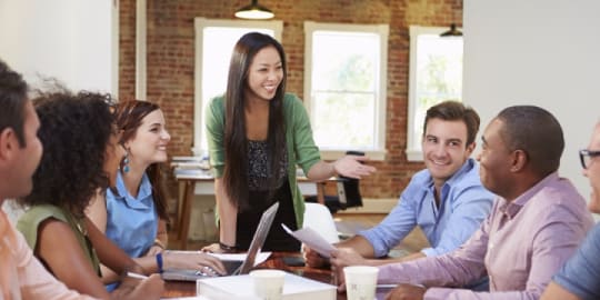 woman speaking at meeting
