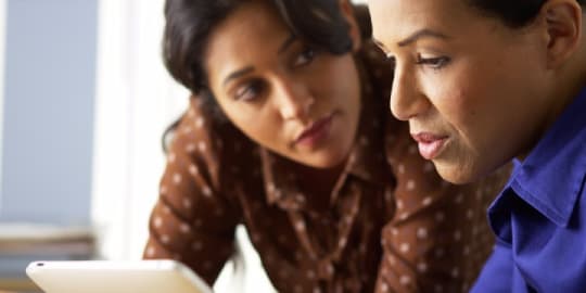 woman training woman at work