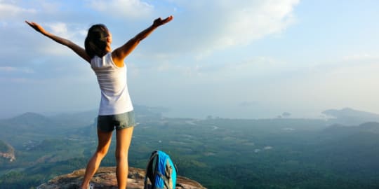 Woman on mountaintop