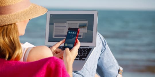 woman working while on vacation 