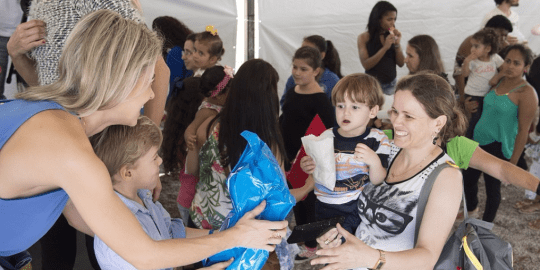 Volunteers working with children