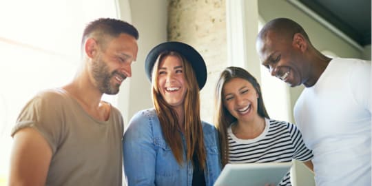 Coworkers laughing together